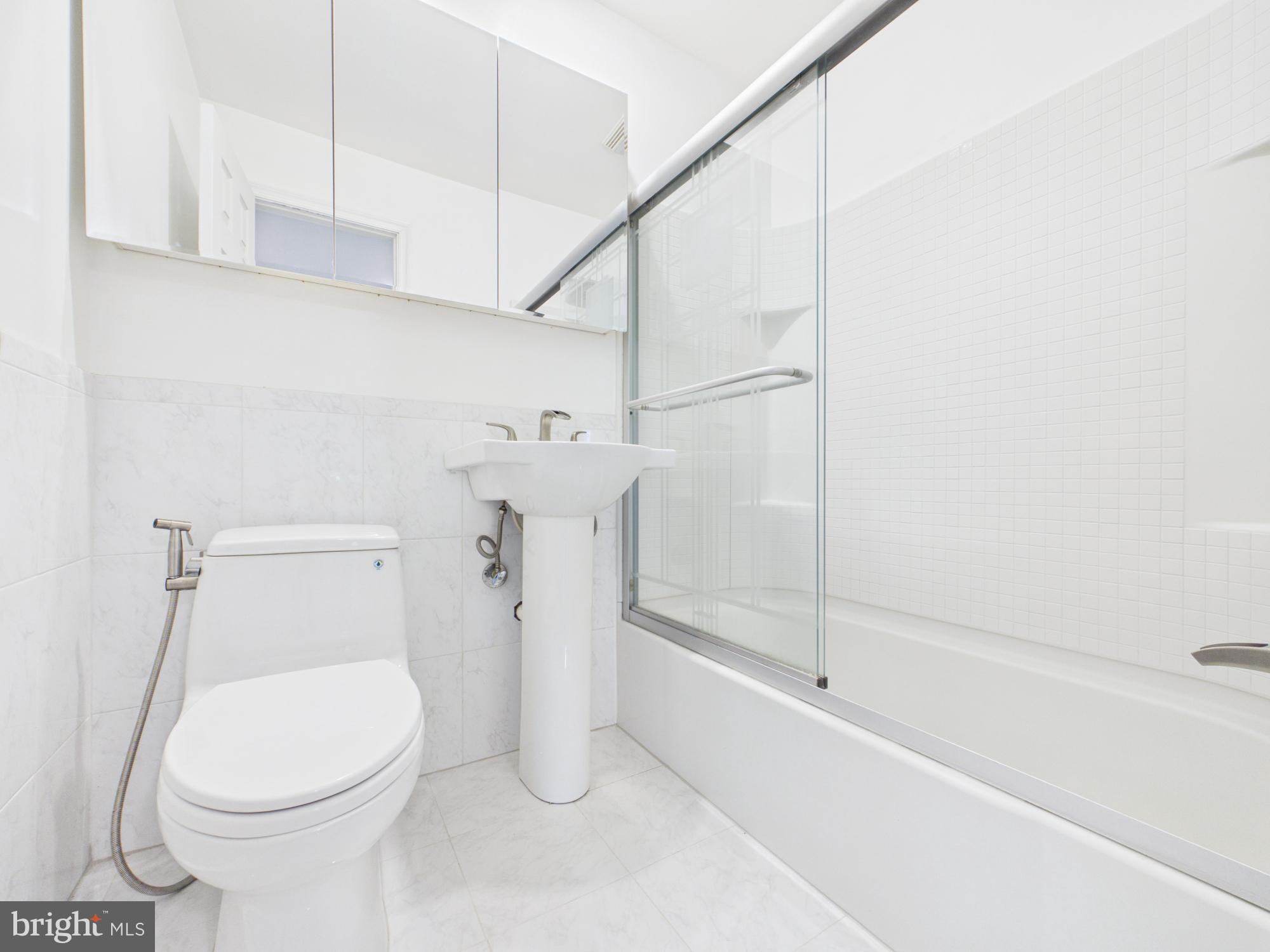 5512 Kathleen Place Springfield, VA 22151 - Photo 32 of 42 Modern bathroom with sleek design.