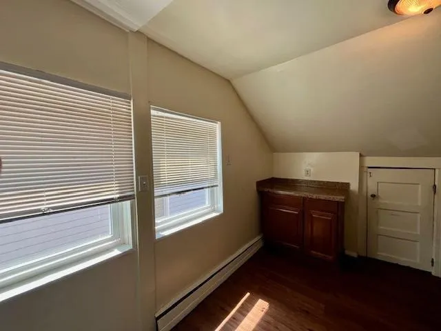 a room with furniture and a window