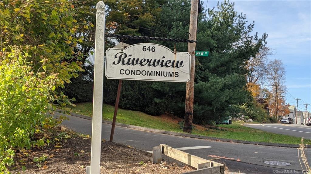 646 Howe Avenue, Unit 23 Shelton, CT 06484 - Photo 1 of 1 a sign on the side of a road