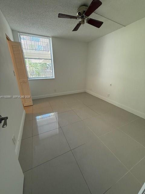 20381 Northeast 30th Avenue, Unit 2047 Aventura, FL 33180 - Photo 10 of 21 a view of an empty room with a window