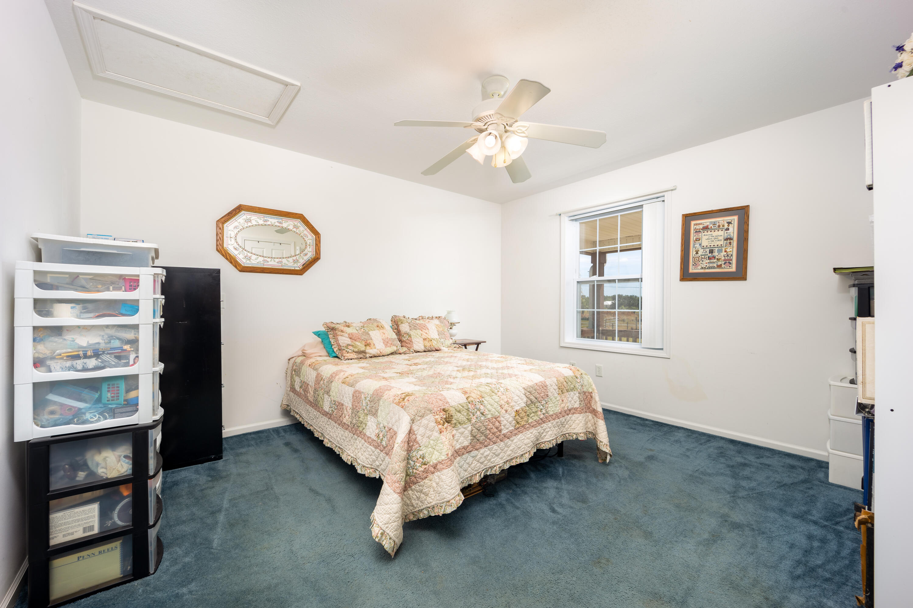 1101 Trowbridge Road Fort Pierce, FL 34945 - Photo 30 of 38 a bedroom with a bed and a window