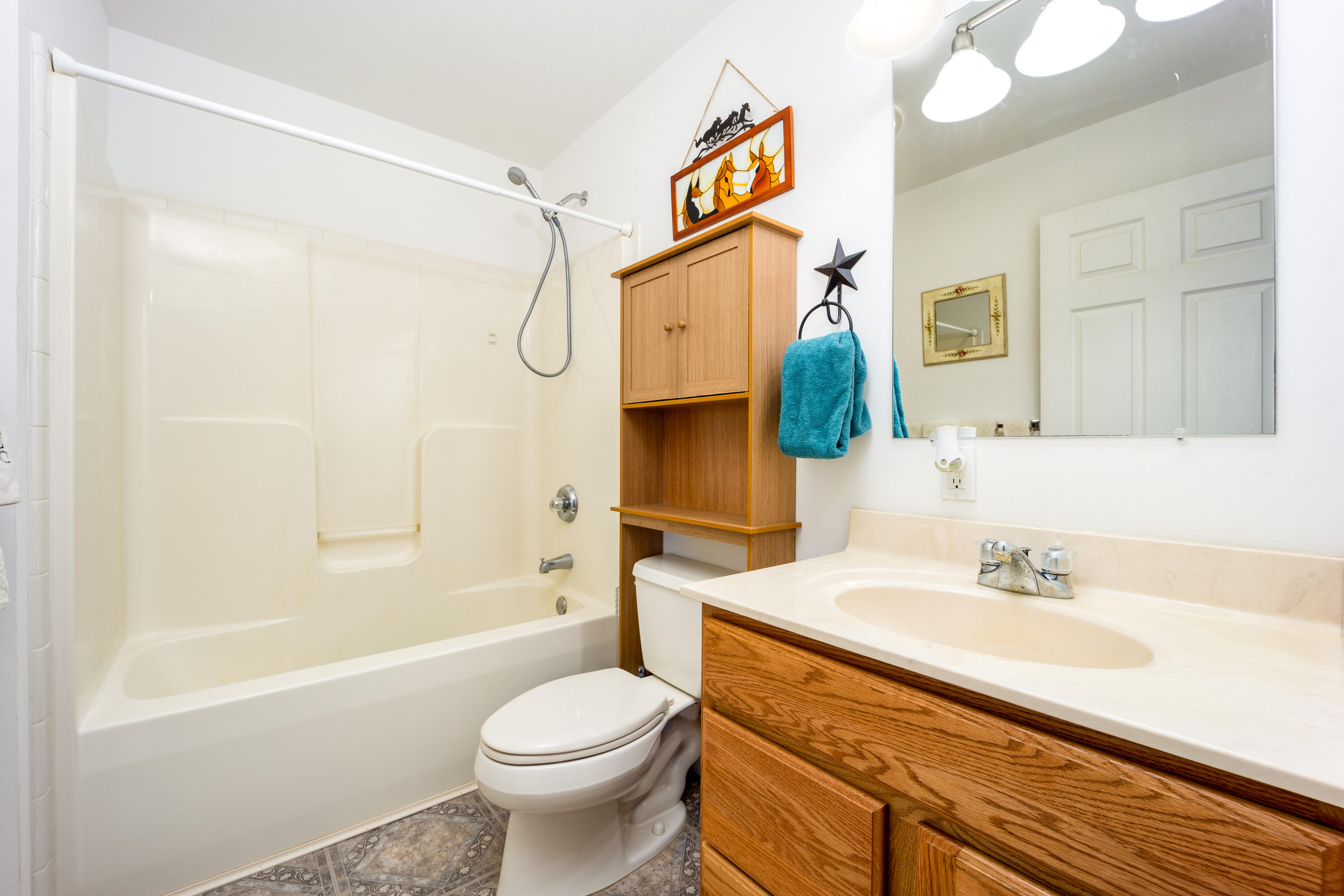1101 Trowbridge Road Fort Pierce, FL 34945 - Photo 33 of 38 a bathroom with a sink a toilet and shower