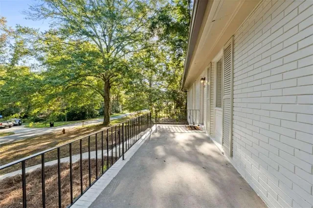 a view of a balcony with an outdoor space