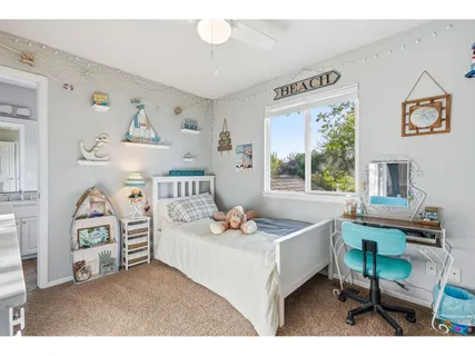 a bedroom with furniture and a bed