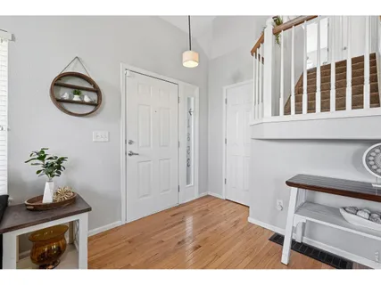 a view of a hallway with washer and dryer