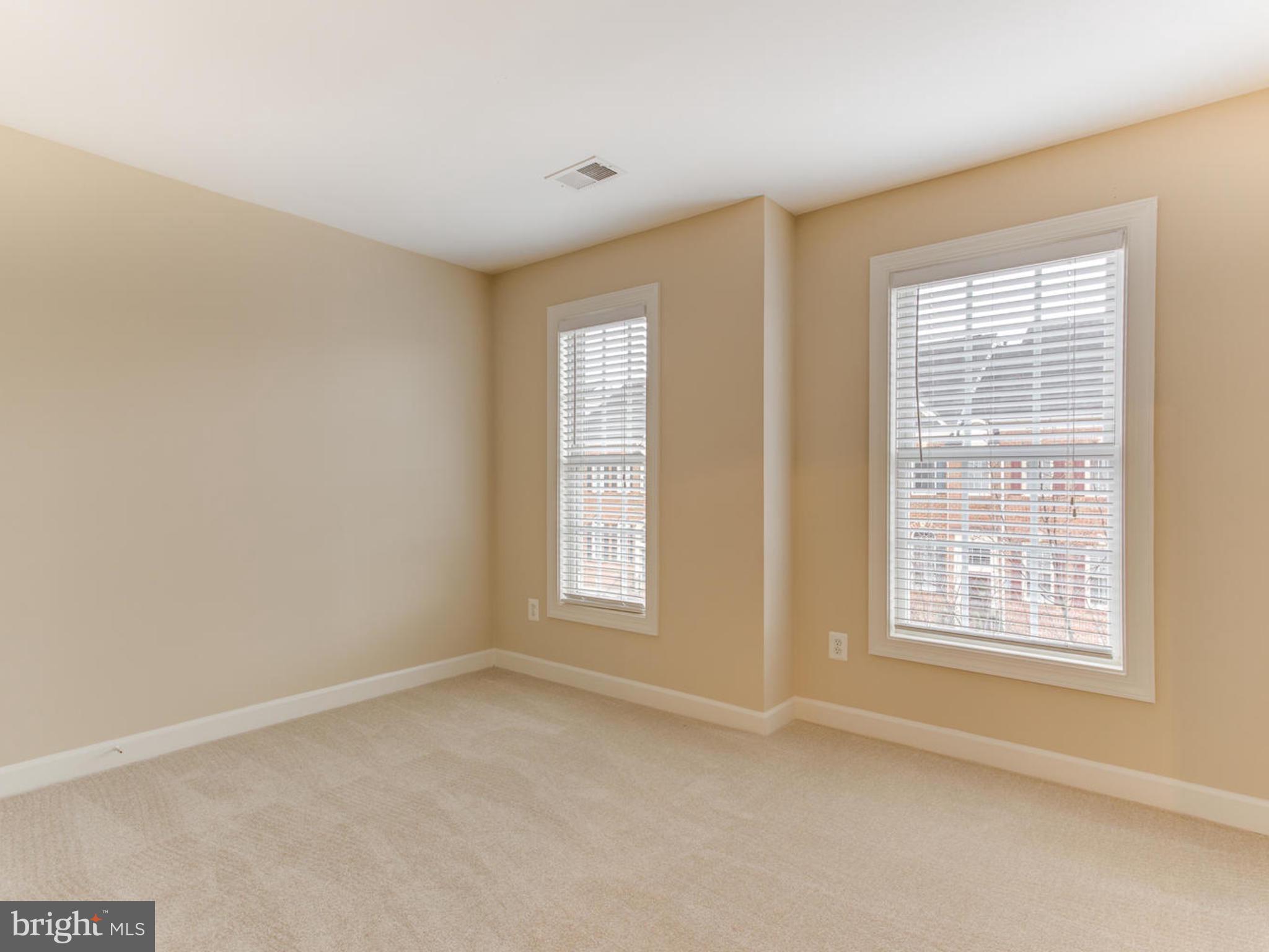 43802 Bent Creek Terrace Leesburg, VA 20176 - Photo 31 of 40 a view of an empty room with a window