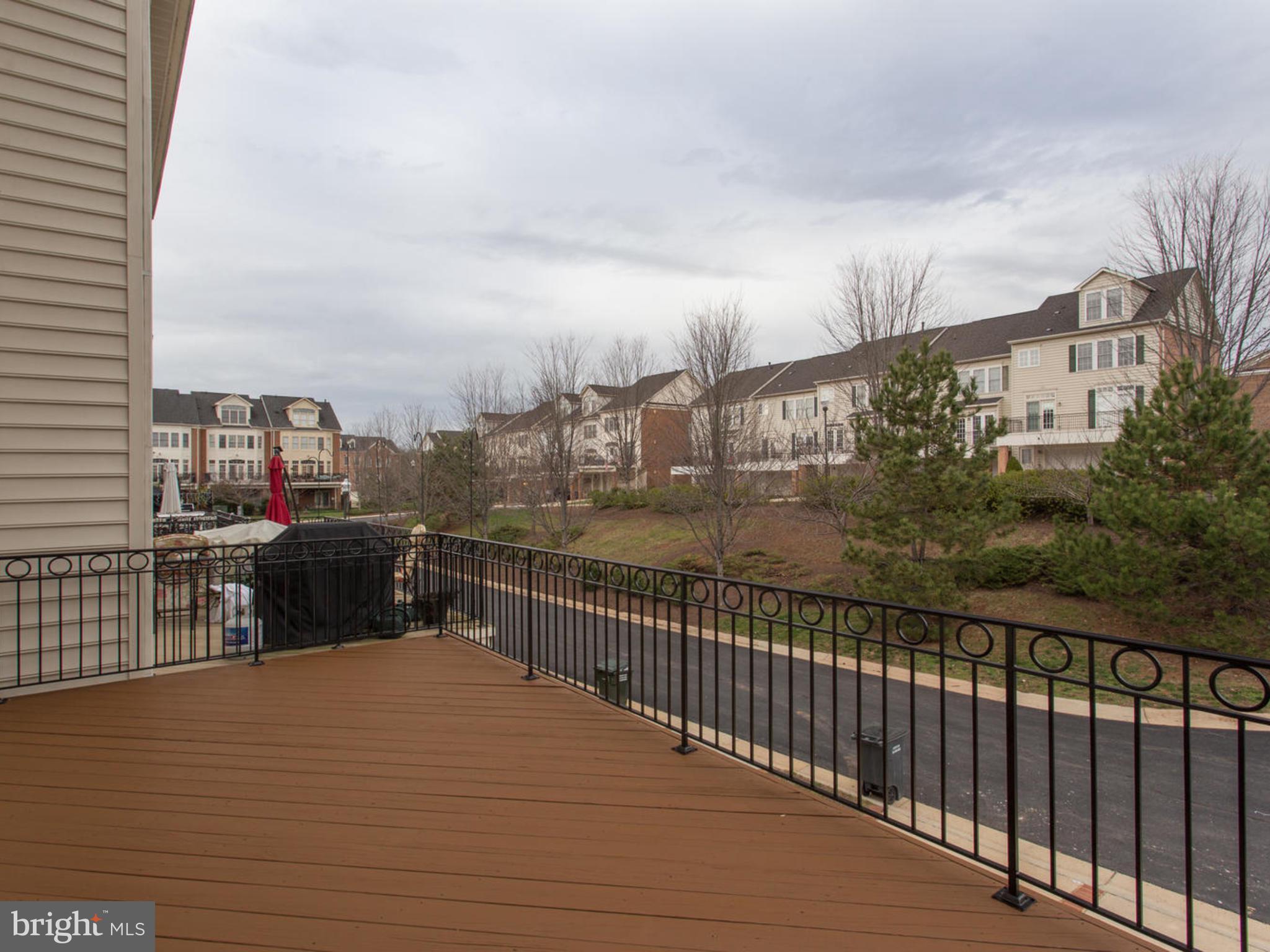 43802 Bent Creek Terrace Leesburg, VA 20176 - Photo 36 of 40 a view of a city from a balcony