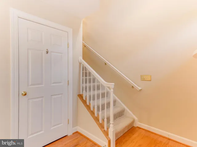 a view of entryway with wooden floor