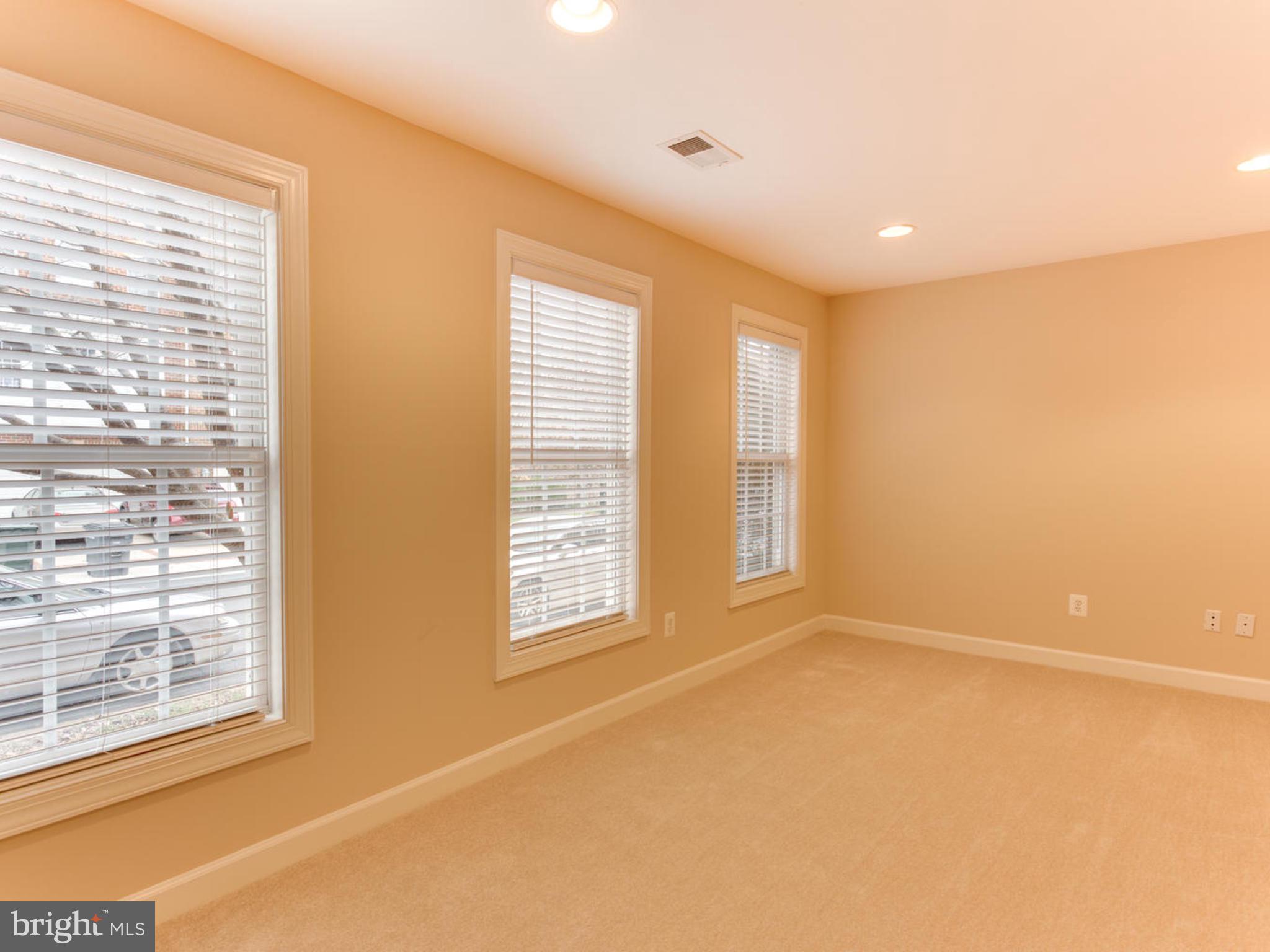 43802 Bent Creek Terrace Leesburg, VA 20176 - Photo 8 of 40 a view of an empty room with a window