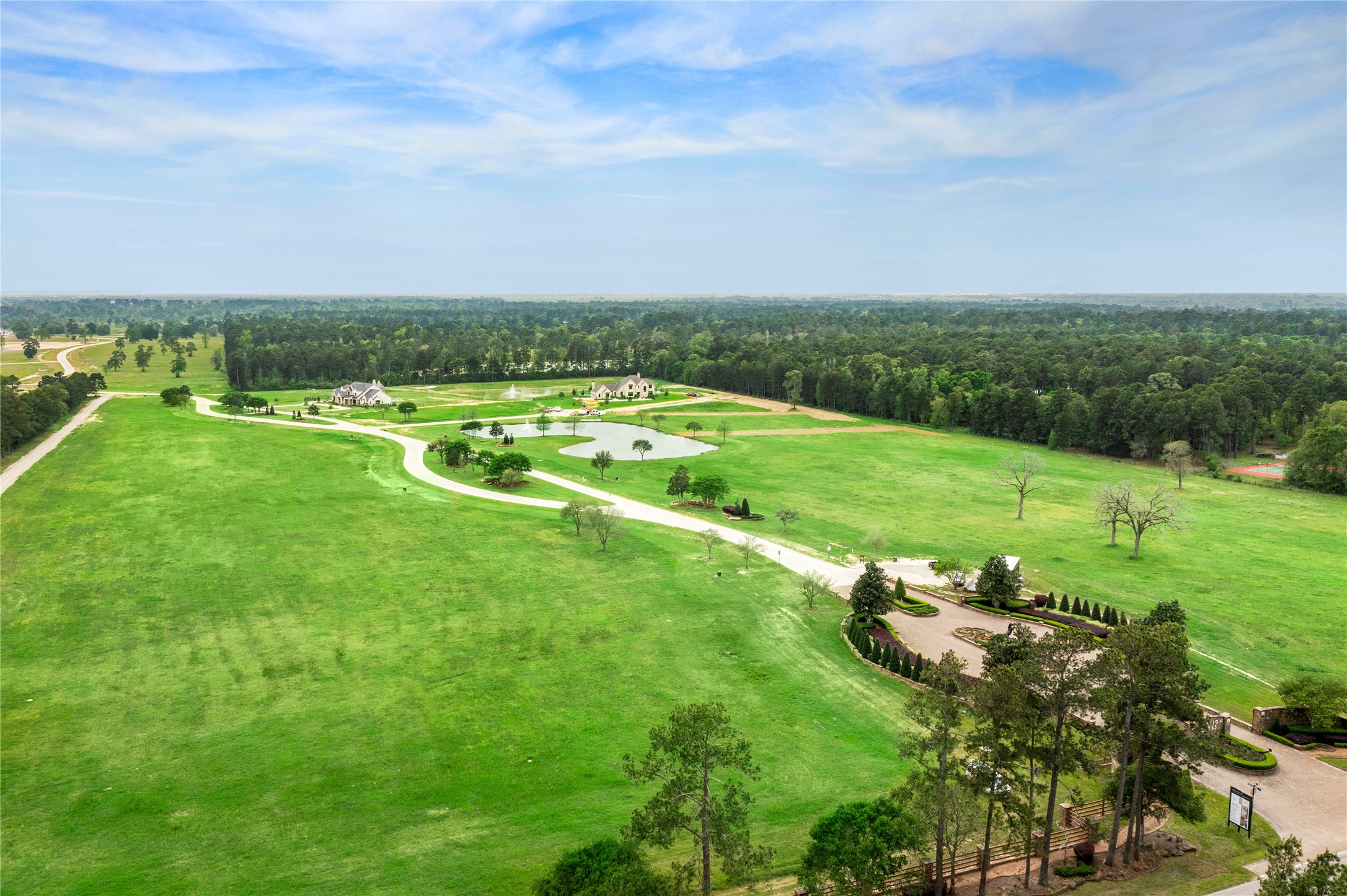 2044 Stallion Lakes Avenue Hockley, TX 77447 - Photo 13 of 17 This aerial shows the depth of the acreage and its wide-open views toward the tree line. It gives a clear look at how the land sits within the natural landscape.