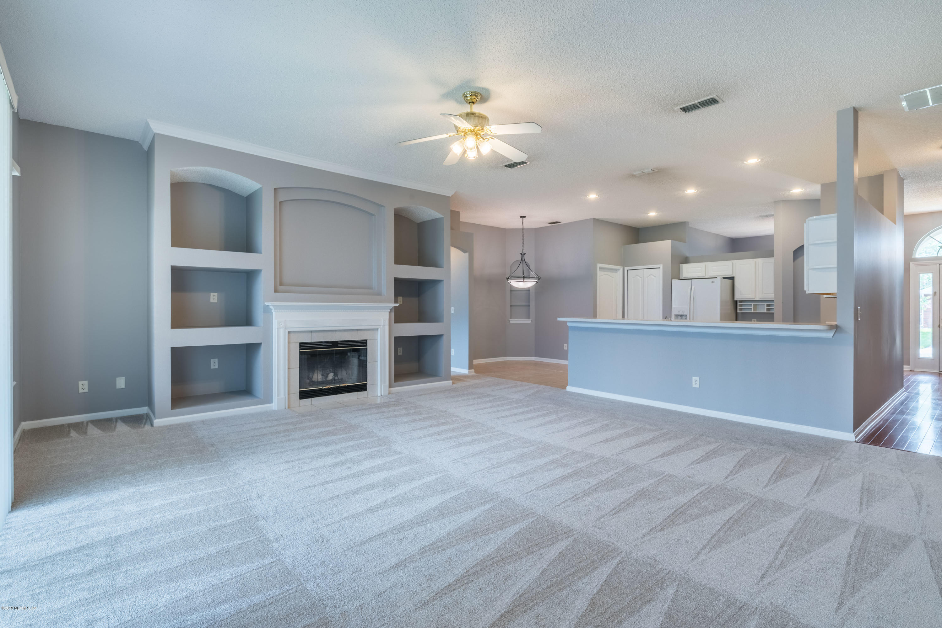 10368 Sugar Grove Road Jacksonville, FL 32221 - Photo 12 of 28 a view of a kitchen with a sink and a kitchen