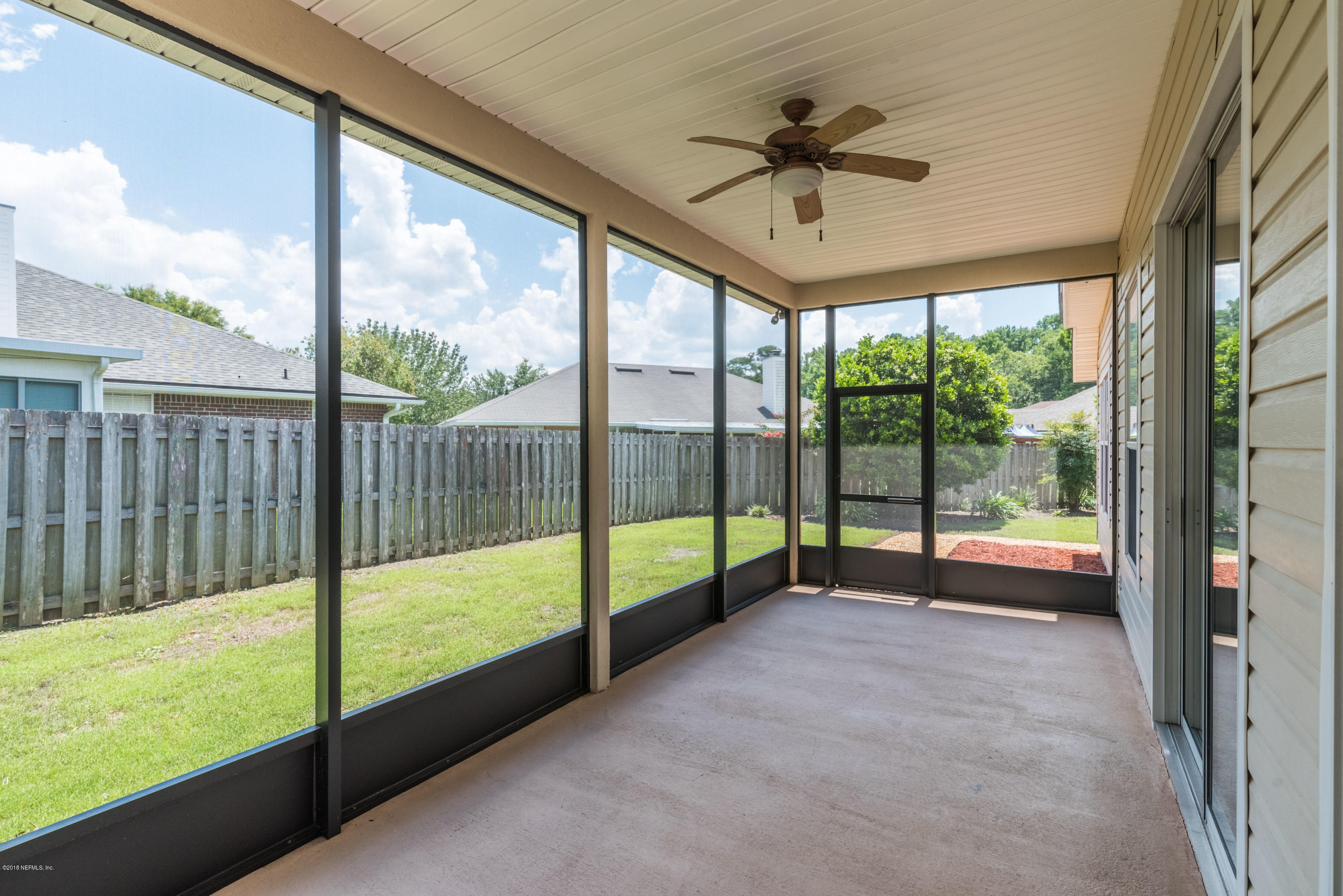 10368 Sugar Grove Road Jacksonville, FL 32221 - Photo 22 of 28 a view of an empty room and window
