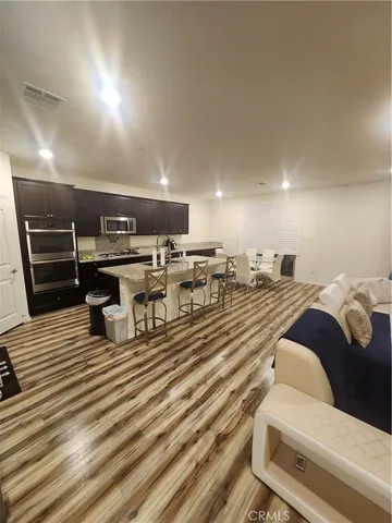 a bed room with a bed and a view of en suite bathroom