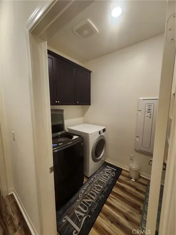 a bedroom with bed and a window