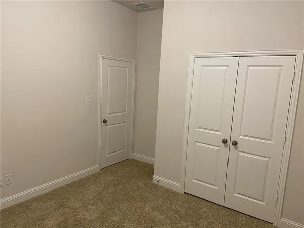 an empty room with closet