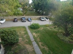 291 Broadway, Unit D Haverhill, MA 01832 - Photo 2 of 10 a view of a chairs and table on the side of the road