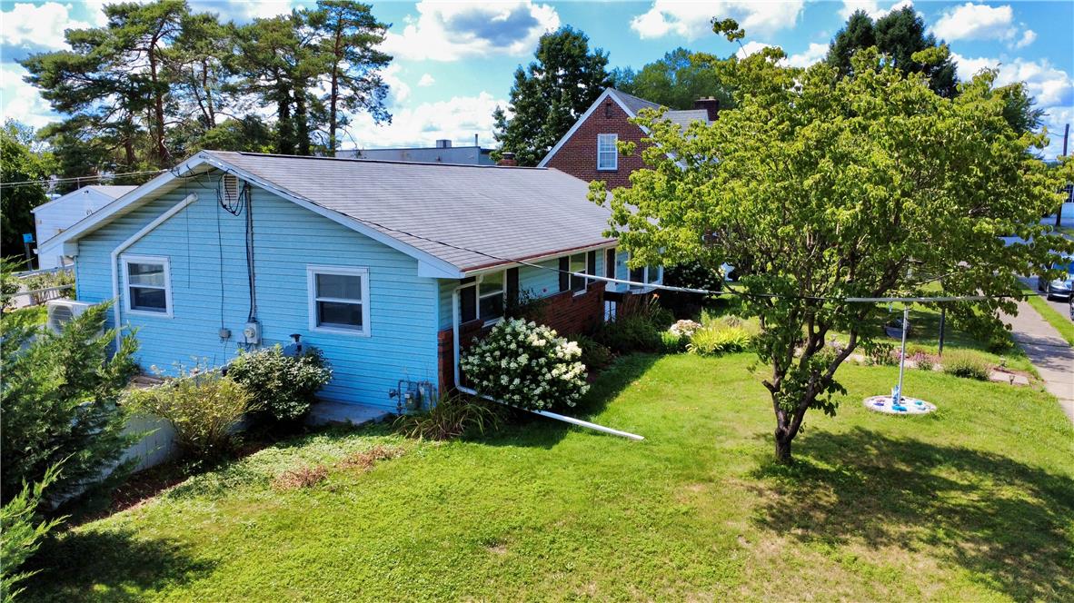 719 Keystone Avenue Bethlehem, PA 18018 - Photo 6 of 32 A pleasant blue home with ample yard space and mature trees.