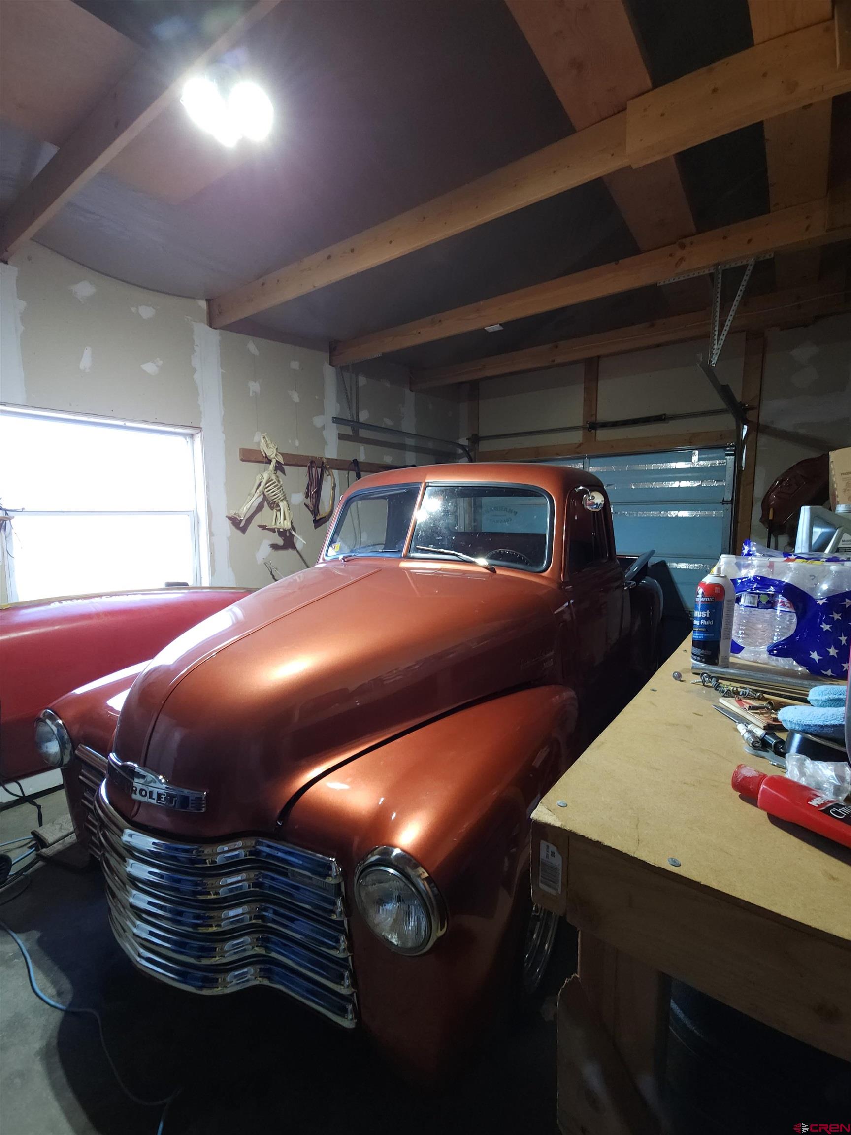323 Holiday Overlook Crestone, CO 81131 - Photo 13 of 30 a room with a bed and a table