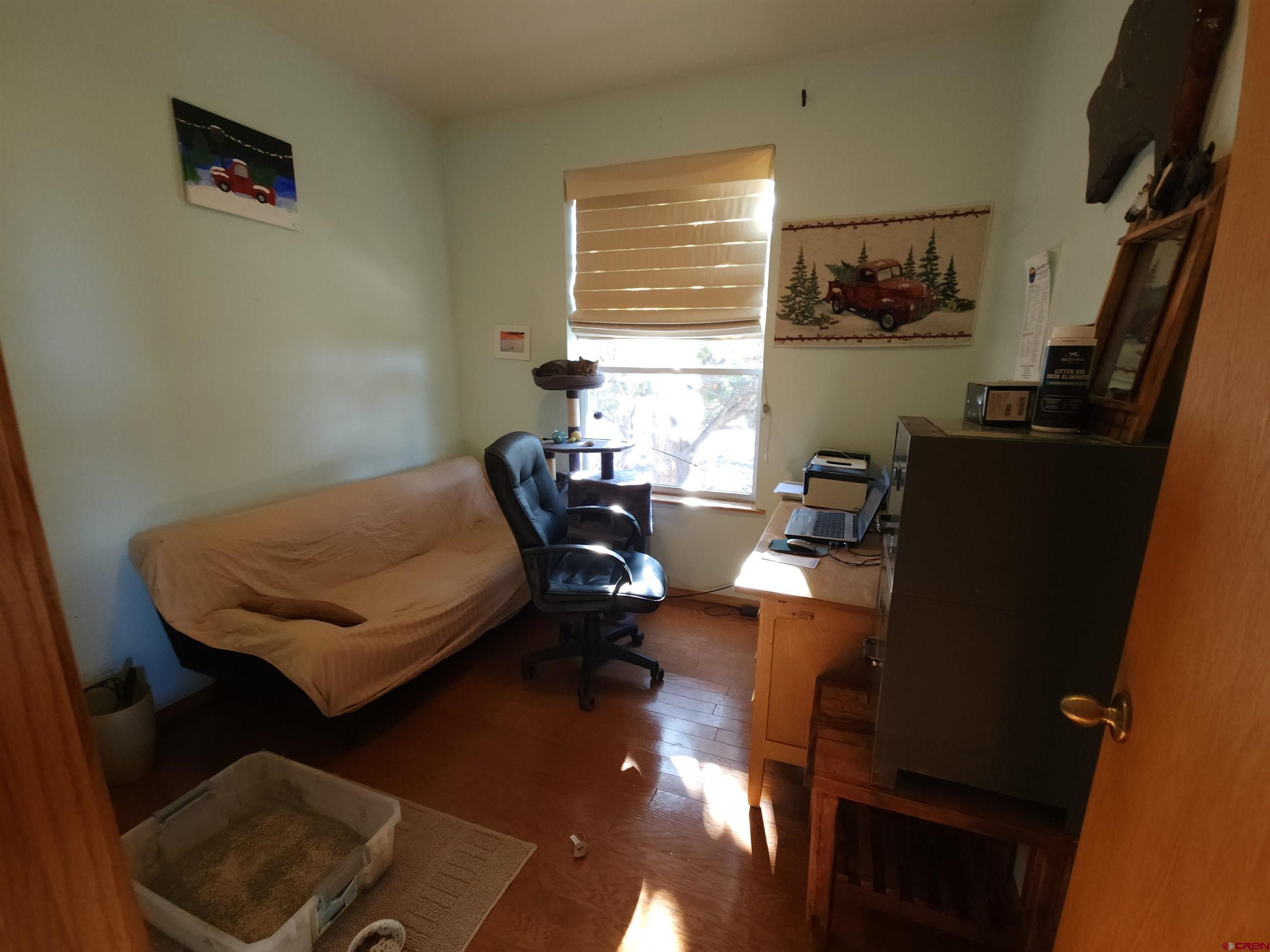 323 Holiday Overlook Crestone, CO 81131 - Photo 20 of 30 a living room with furniture and a window