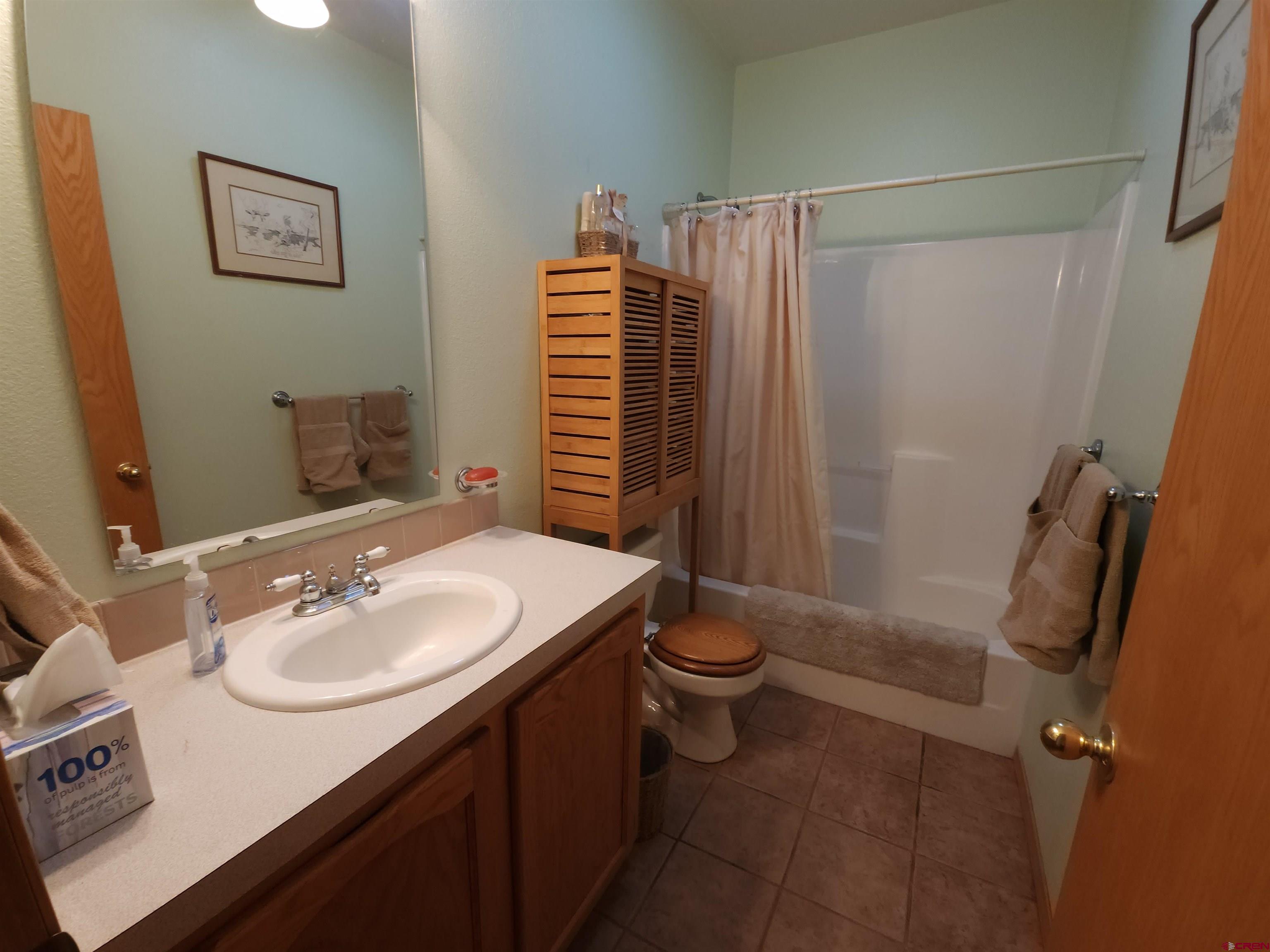 323 Holiday Overlook Crestone, CO 81131 - Photo 6 of 30 a bathroom with a sink toilet and shower