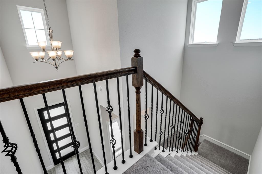 8526 Royal Star Road Rowlett, TX 75089 - Photo 15 of 21 a view of a balcony with wooden floor
