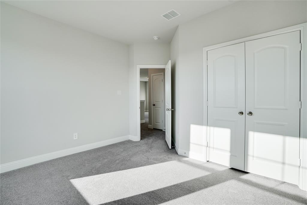 8526 Royal Star Road Rowlett, TX 75089 - Photo 16 of 21 a view of an empty room with window