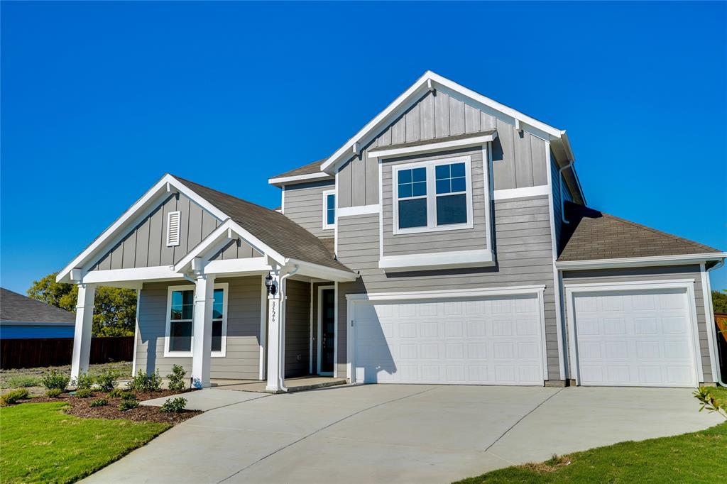8526 Royal Star Road Rowlett, TX 75089 - Photo 3 of 21 a front view of a house with a yard