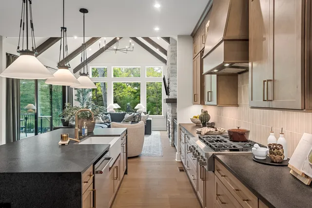a view of a kitchen with refrigerator and washer