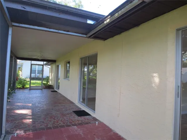 a view of a house with a street