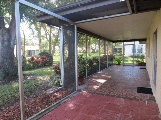 a view of yard with porch