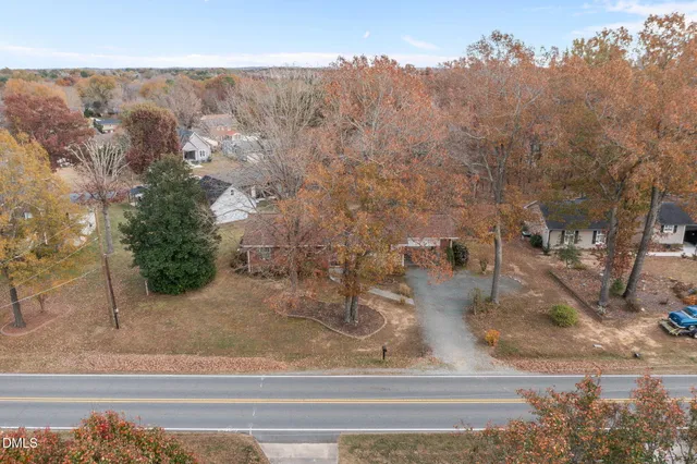 a view of a house with a street
