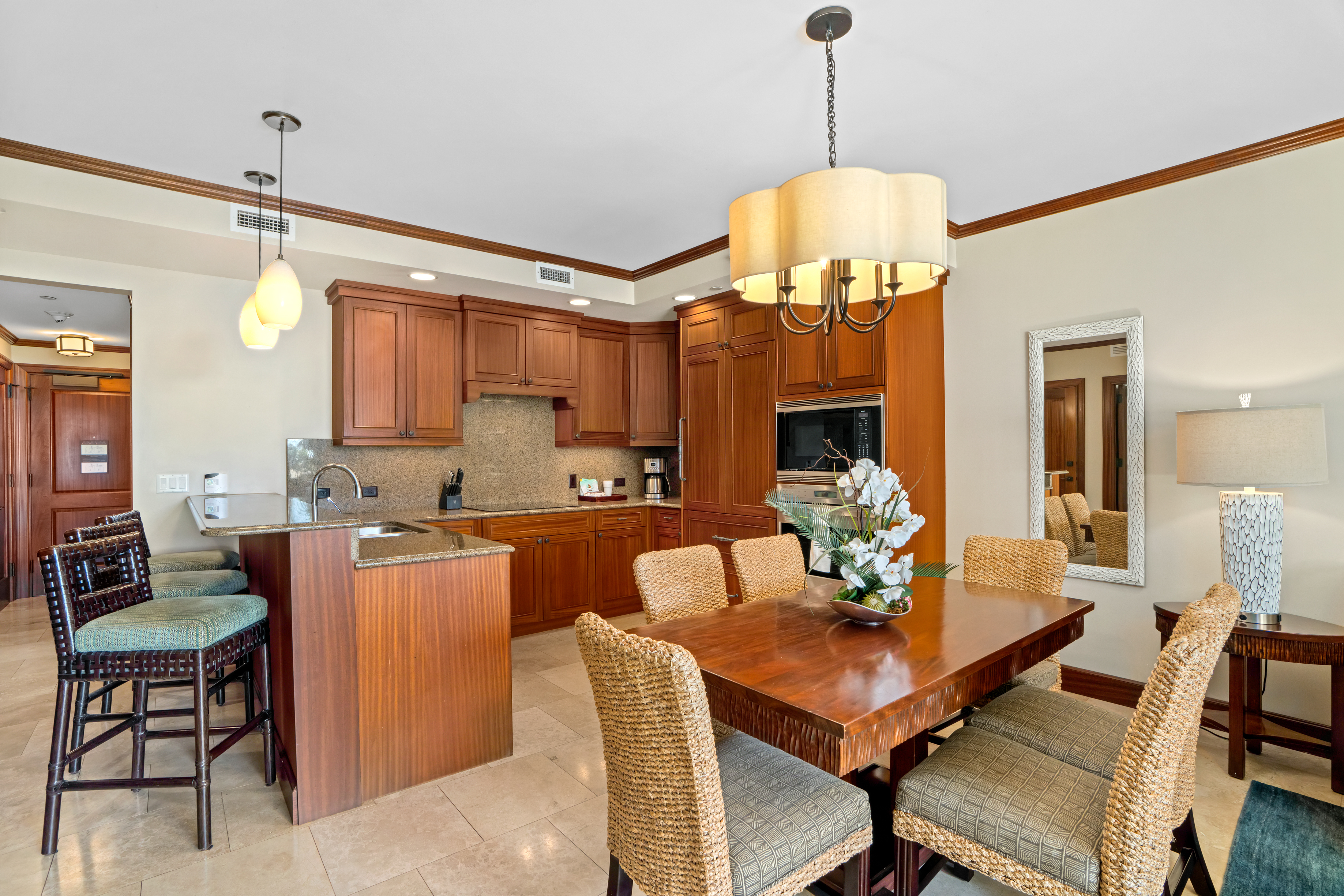 2641 Poipu Road, Unit 1107 Koloa, HI 96756 - Photo 4 of 22 a view of a dining room with furniture window and wooden floor