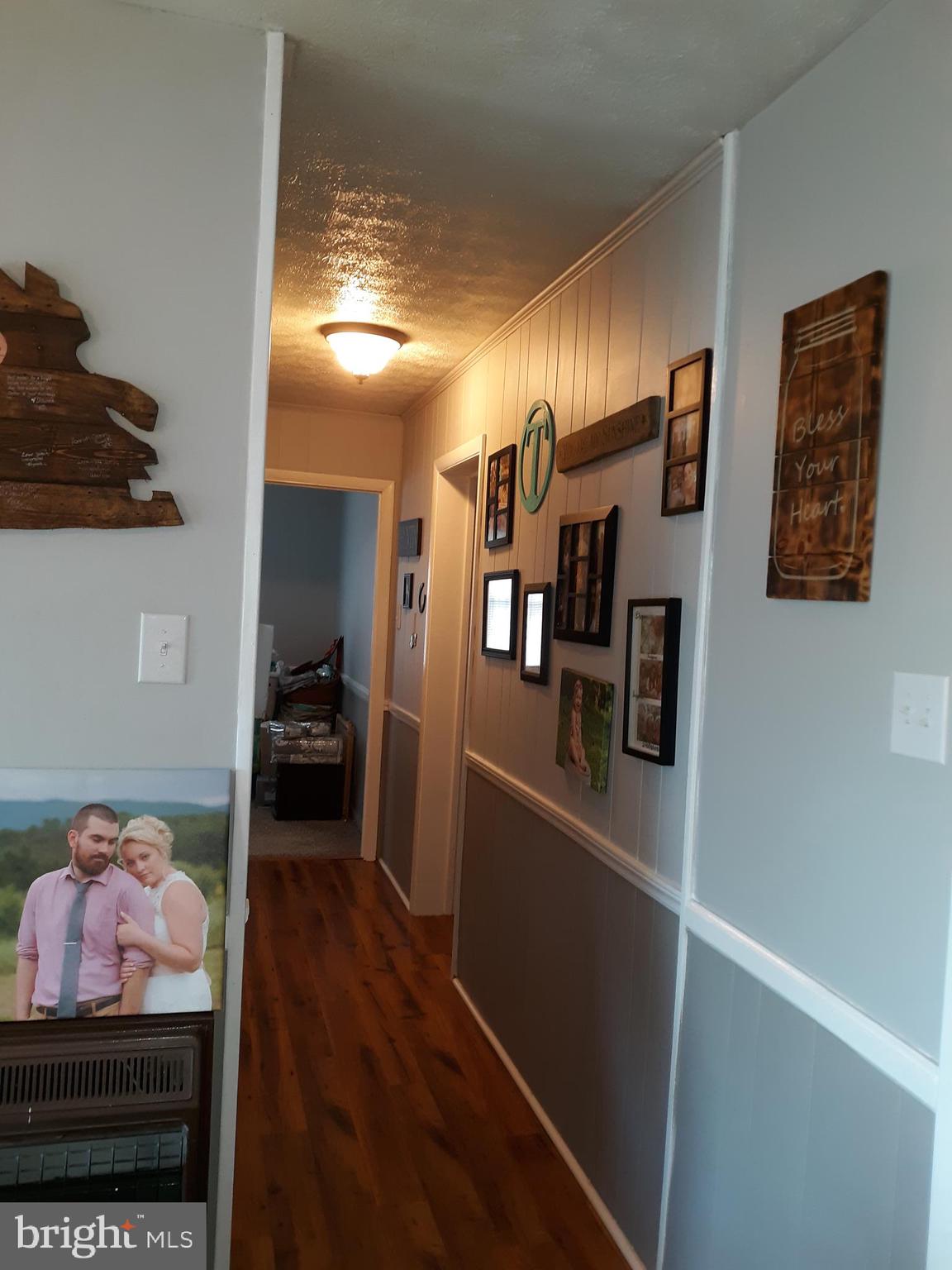 166 Grover Road Edinburg, VA 22824 - Photo 13 of 14 View of hallway to third bedroom