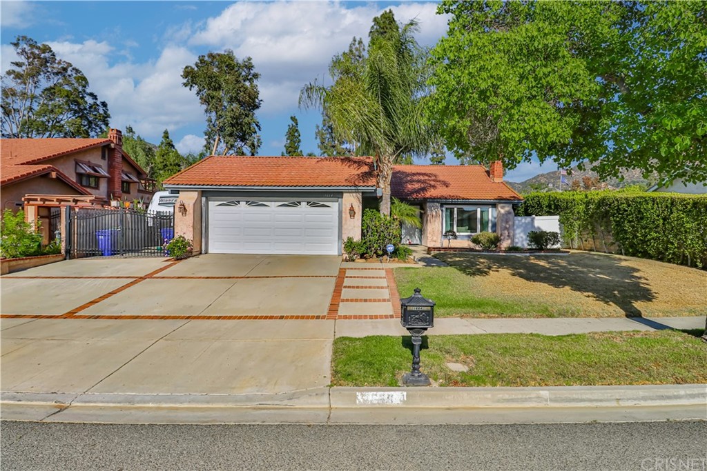1664 Flowerdale Street Simi Valley, CA 93063 - Photo 1 of 1 a front view of a house with a yard