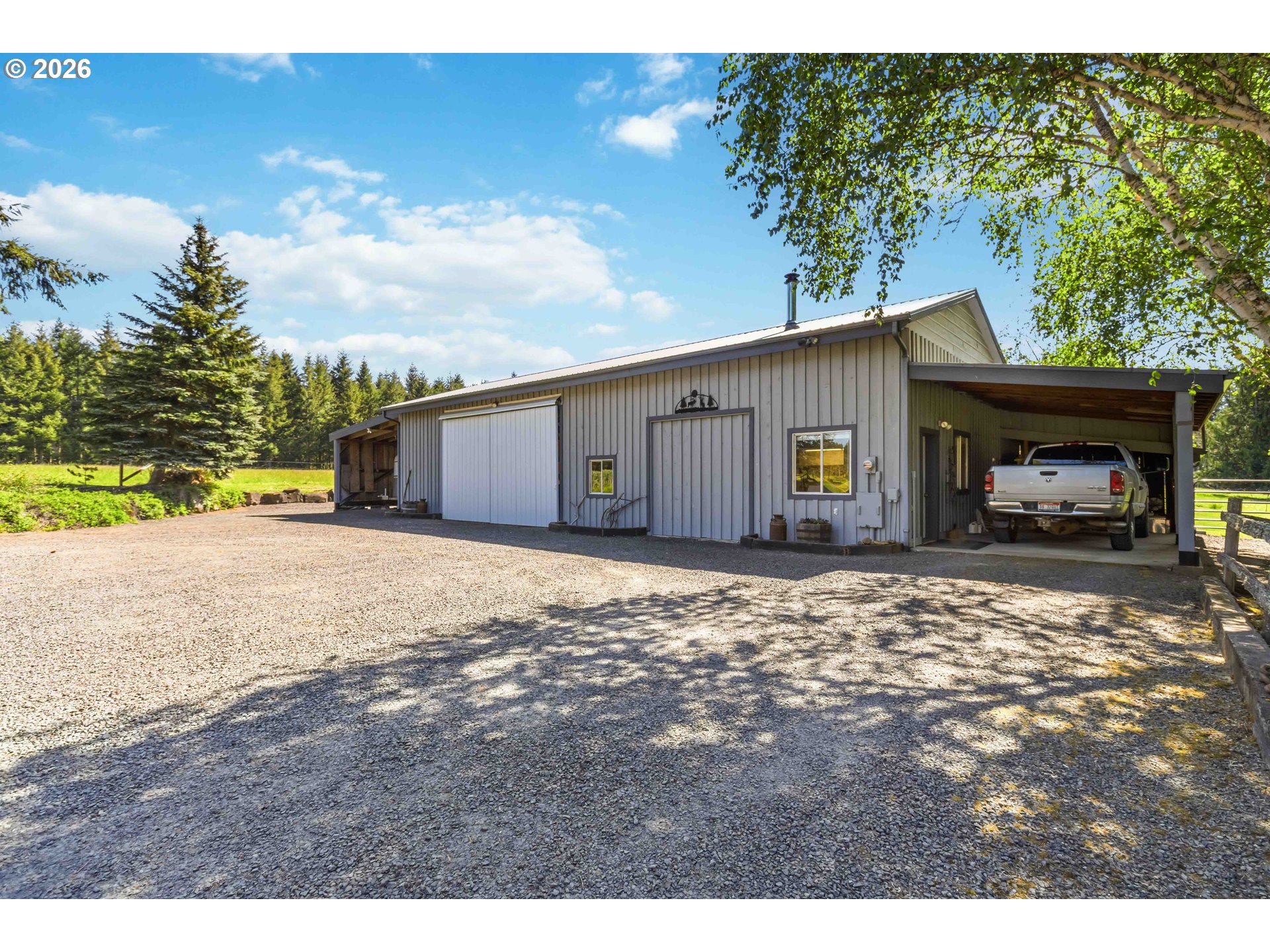 359 Frank Smith Road Toutle, WA 98649 - Photo 31 of 44 a view of a house with a yard and garage