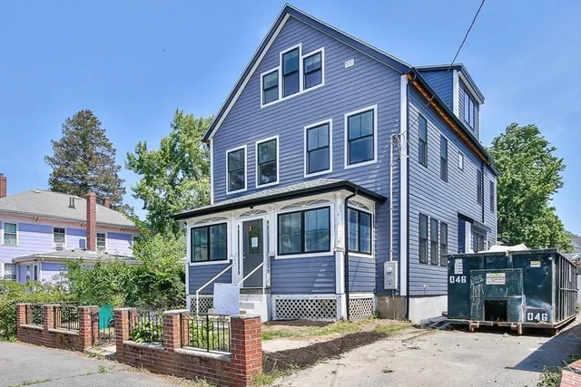 a front view of a house with street