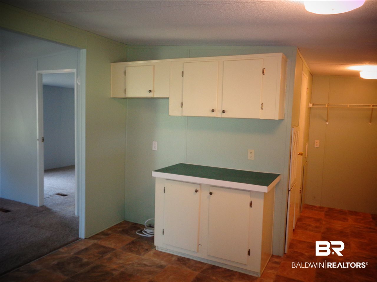 21535 A Glass And Spivey Road Robertsdale, AL 36567 - Photo 12 of 32 Whirlpool Electric range w/hood. Dishwasher.