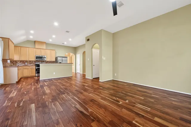 a view of kitchen with wooden floor