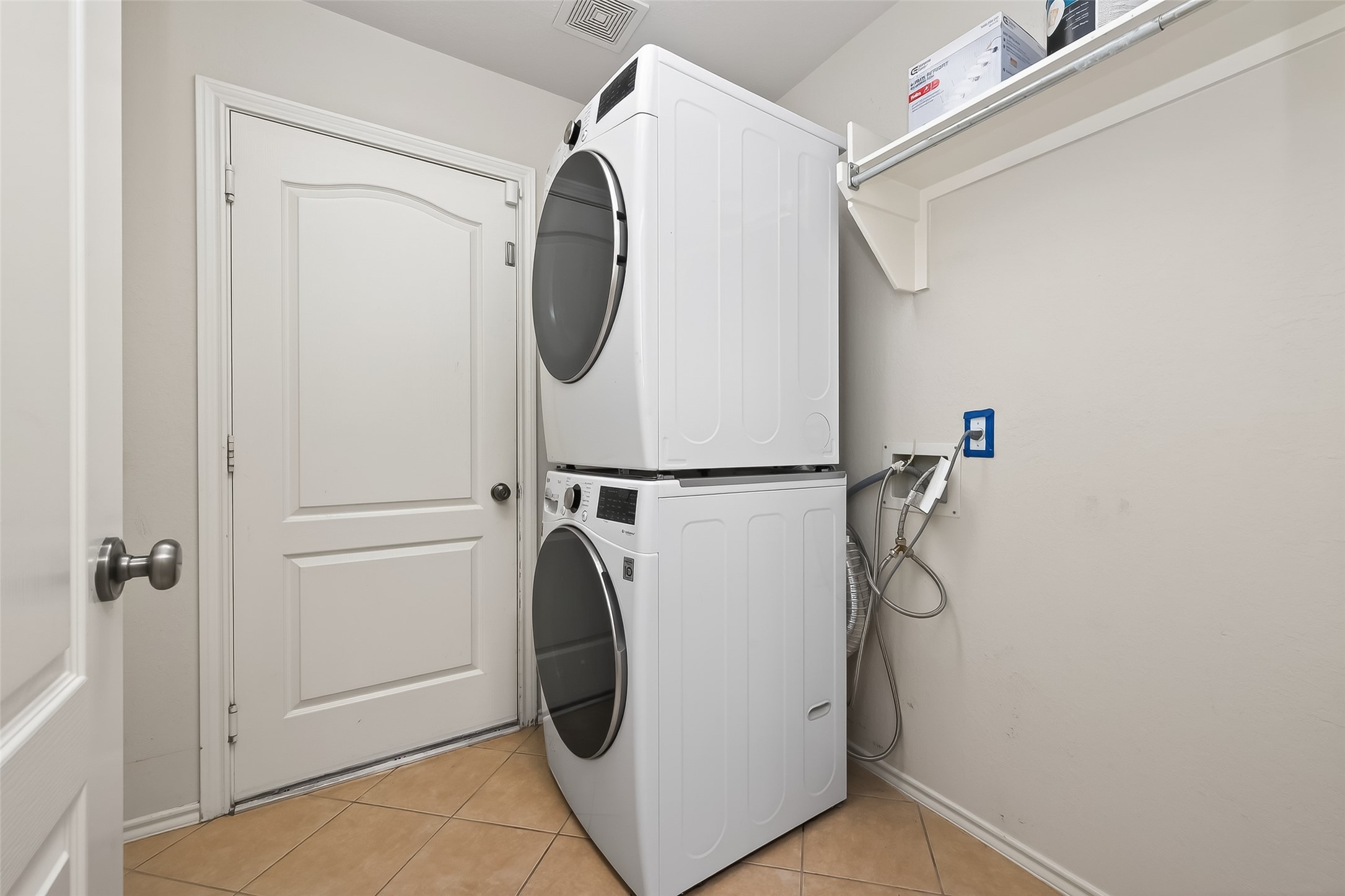 2311 Cory Crossing Lane Spring, TX 77386 - Photo 35 of 48 a utility room with dryer and washer