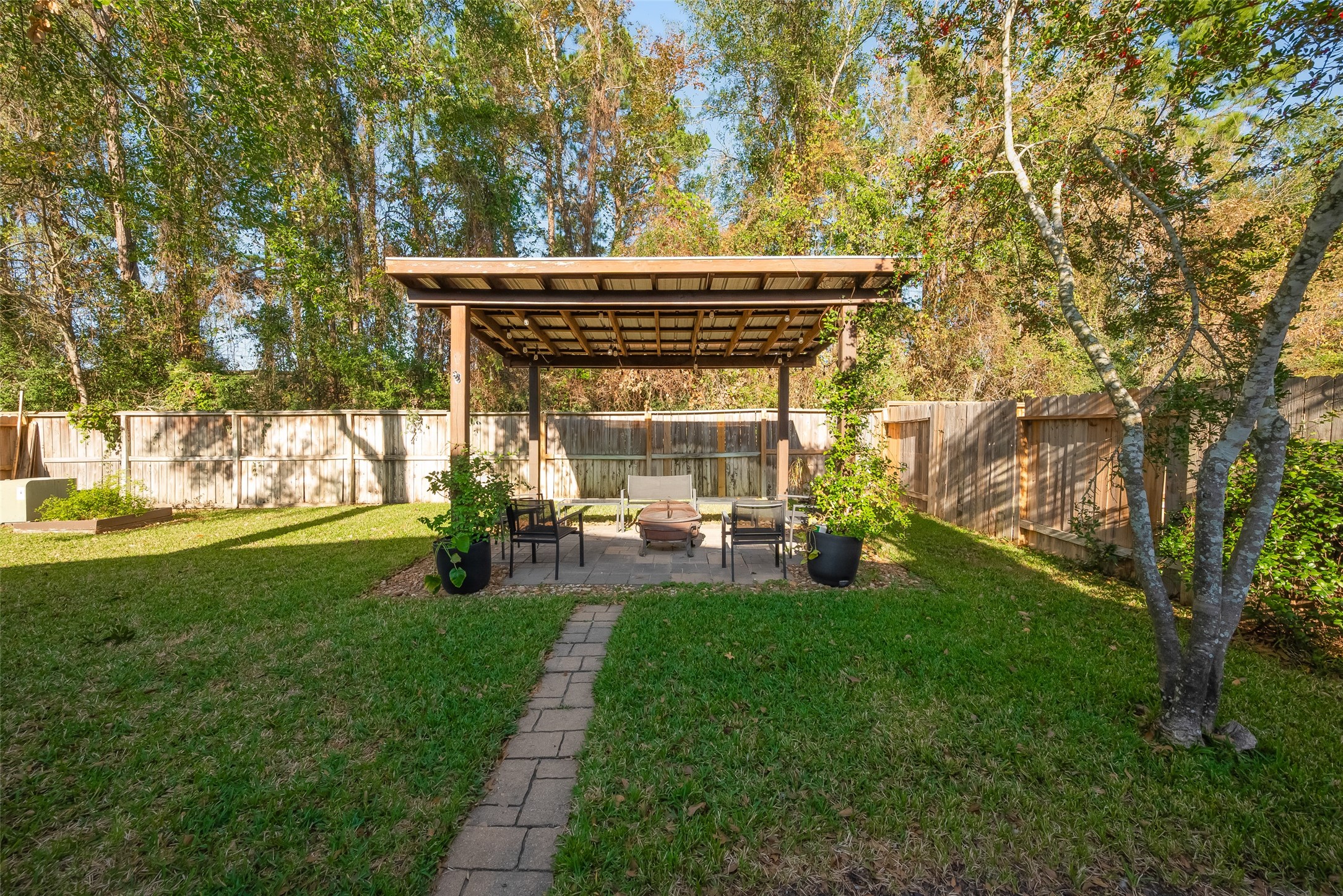 2311 Cory Crossing Lane Spring, TX 77386 - Photo 42 of 48 a view of backyard with a patio