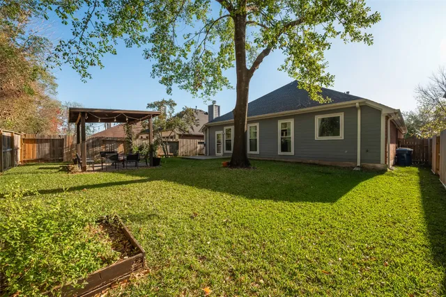 a view of a patio with chairs and tables