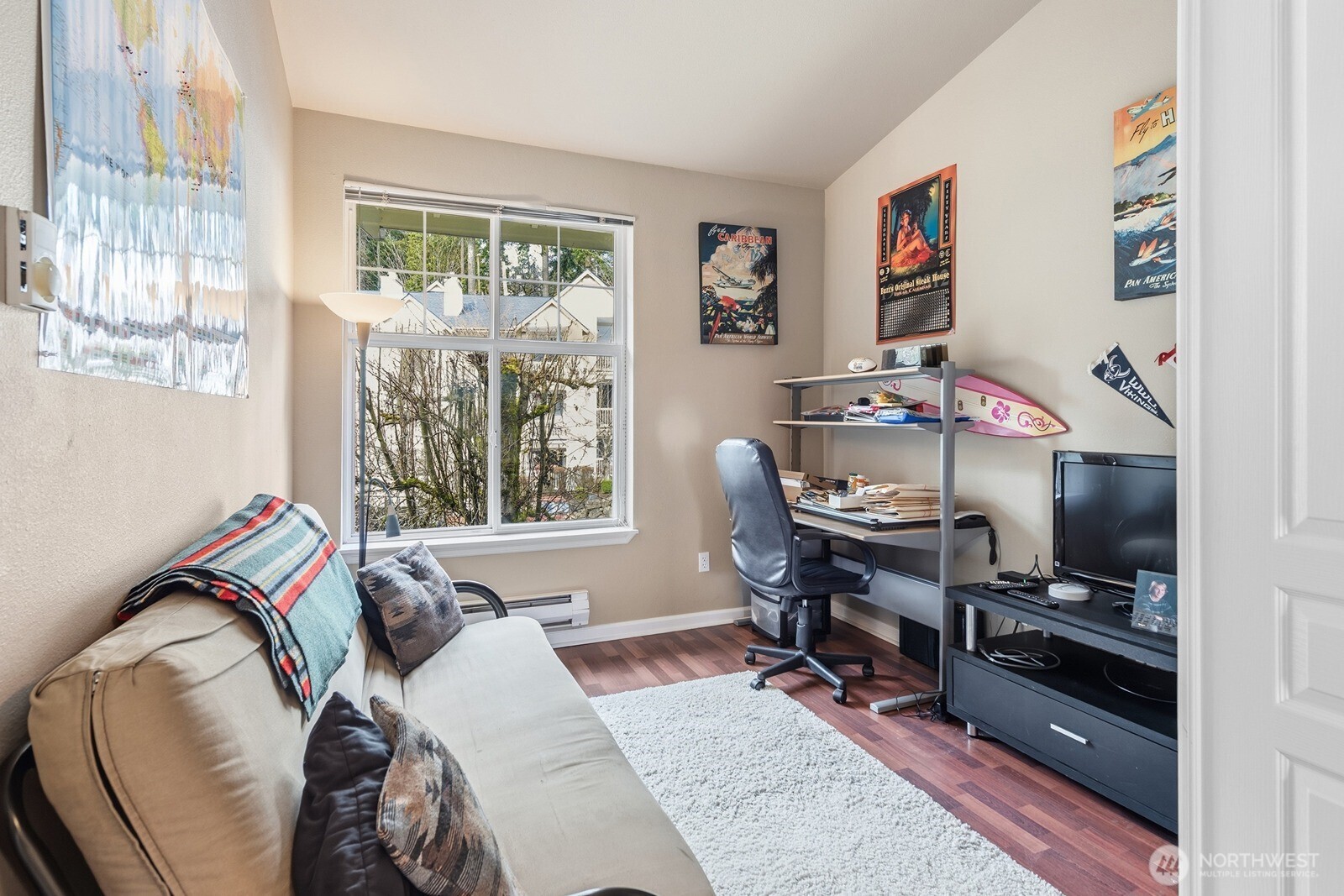 23420 Southeast Black Nugget Road, Unit F302 Issaquah, WA 98029 - Photo 14 of 19 a bedroom with a bed and a window