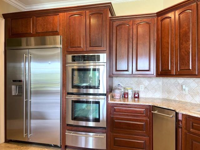 9125 Highway 196 Collierville, TN 38017 - Photo 14 of 40 a kitchen with stainless steel appliances granite countertop a refrigerator and a sink