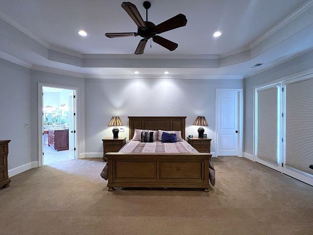 9125 Highway 196 Collierville, TN 38017 - Photo 16 of 40 a spacious bedroom with a bed and a ceiling fan