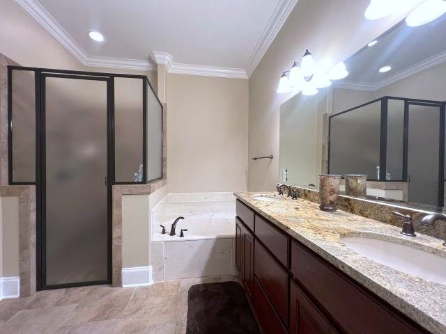 9125 Highway 196 Collierville, TN 38017 - Photo 21 of 40 a bathroom with a tub sink and mirror