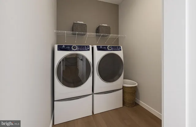 a utility room with dryer and washer