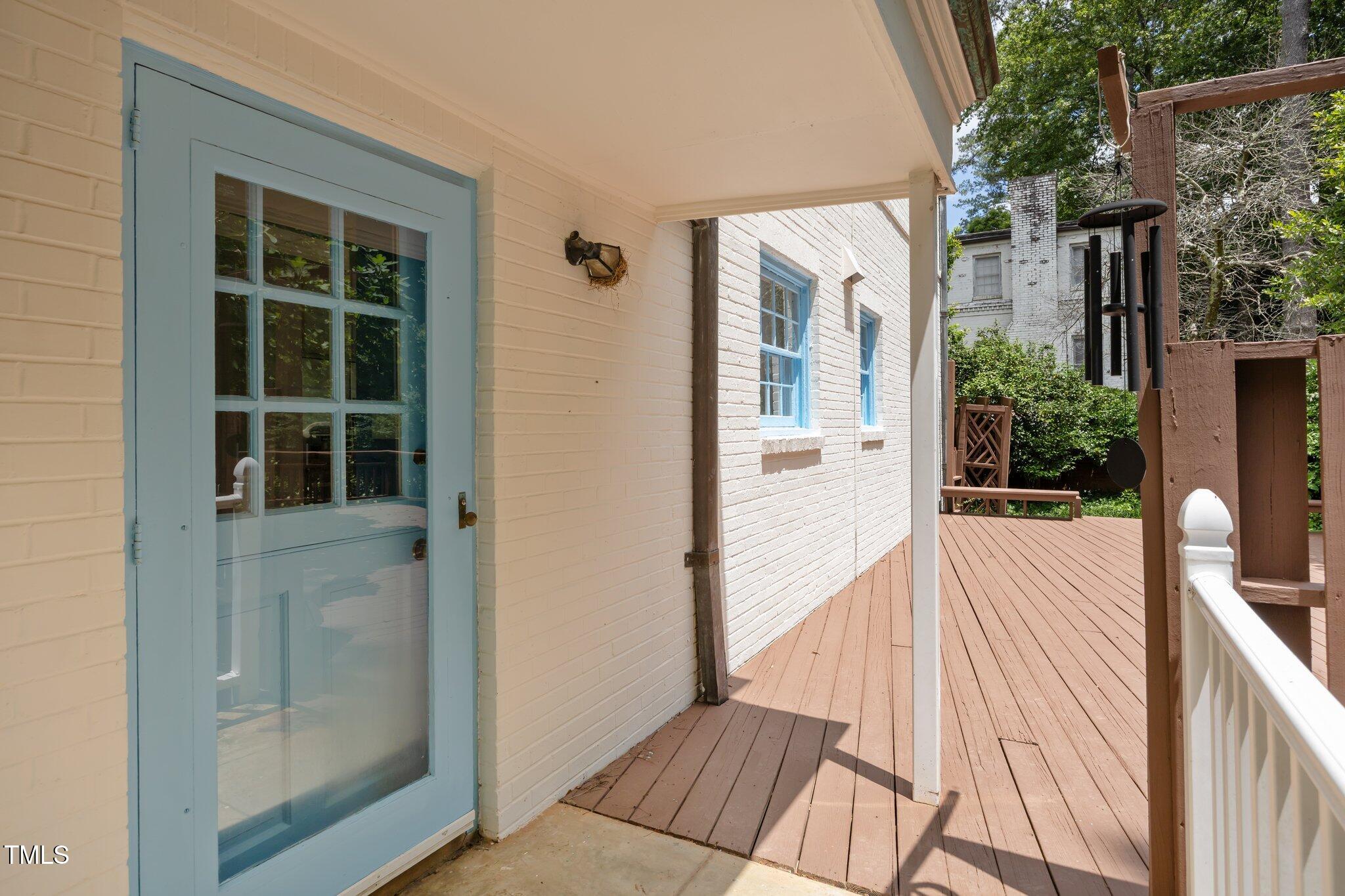 2625 Dover Road Raleigh, NC 27608 - Photo 27 of 57 a view of balcony and floor to ceiling window