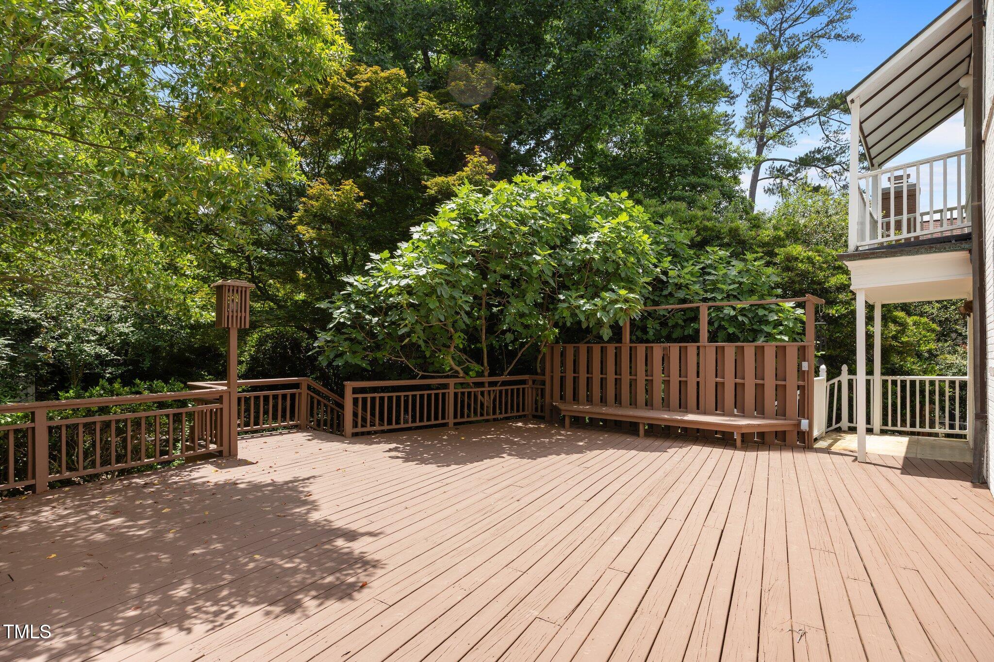 2625 Dover Road Raleigh, NC 27608 - Photo 28 of 57 a view of backyard with a deck and wooden floor