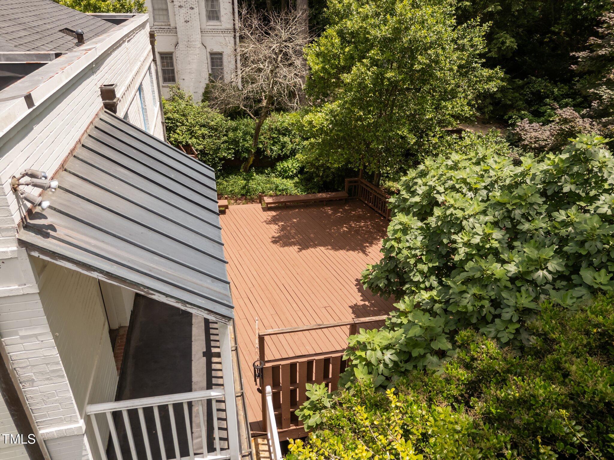 2625 Dover Road Raleigh, NC 27608 - Photo 29 of 57 a balcony with an outdoor space