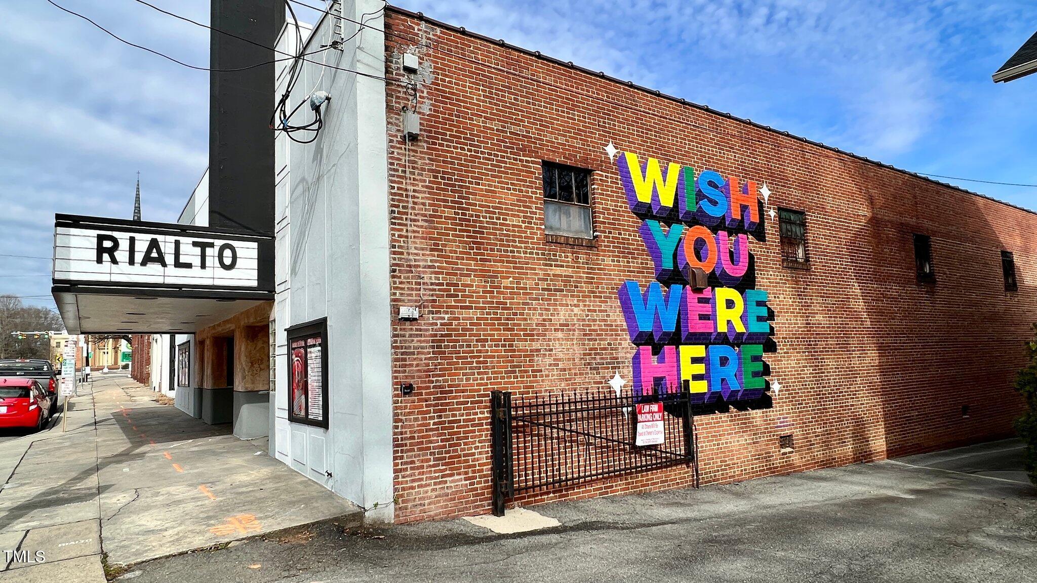2625 Dover Road Raleigh, NC 27608 - Photo 53 of 57 a street sign on a brick wall